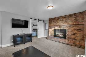 Basement - Brick Fireplace - Guest Suite.