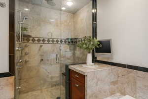 Primary ensuite bathroom featuring walk in 7 head steam shower