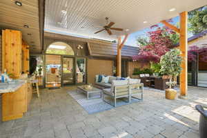 View of patio / terrace featuring ceiling fan and outdoor lounge area