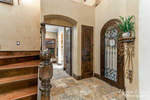 Foyer entrance with tile flooring