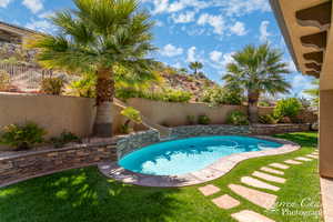 View of pool with a water slide