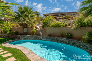 View of pool featuring a water slide