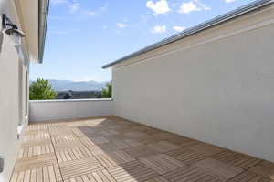 View of patio / terrace featuring a balcony and a mountain view