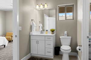 Bathroom featuring toilet and vanity