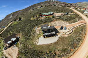 Birds eye view of property featuring a mountain view