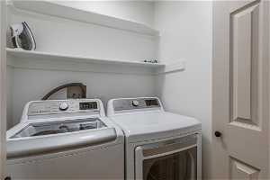 Clothes washing area with independent washer and dryer and washer hookup