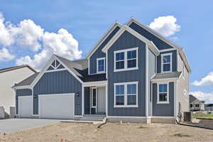 View of front of home featuring a garage