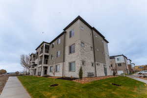 View of building exterior with a garage