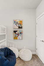 View of carpeted bedroom