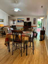 Dining space featuring light hardwood / wood-style floors and ceiling fan