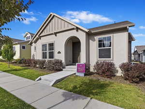 View of front of house with a front yard