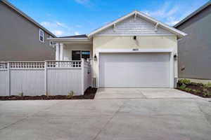 View of front facade featuring a garage