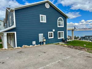 South side of unit featuring a water view