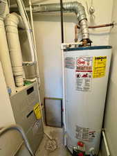 Utility room with gas water heater