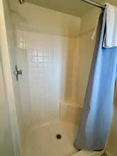 Bathroom featuring tiled shower