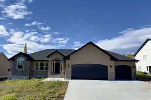 View of front of home featuring a garage