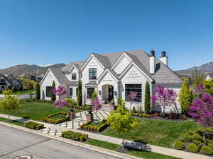 French country inspired facade with a mountain view