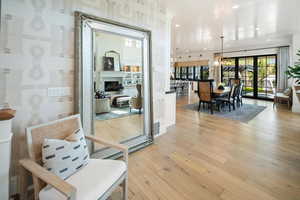 Living area featuring light hardwood / wood-style floors