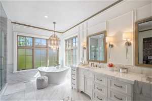 Bathroom featuring tile floors, large vanity, ornamental molding, shower with separate bathtub, and a notable chandelier