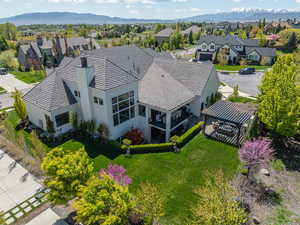 Birds eye view of property with a mountain view