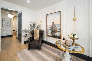 Living area featuring hardwood / wood-style floors