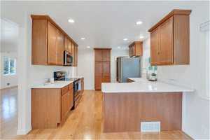 Updated: Stainless steel appliances, solid surface countertops and plenty of cabinets!