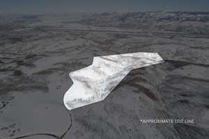 Drone / aerial view of a mountain backdrop