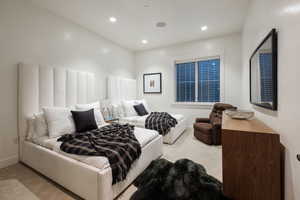 Carpeted bedroom featuring recessed lighting and baseboards