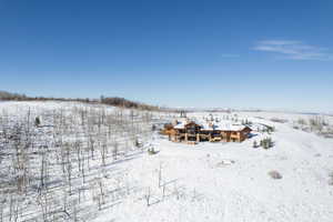 View of yard covered in snow