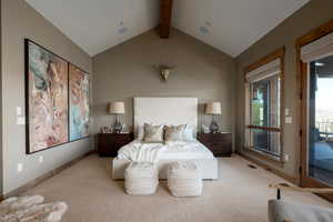 Carpeted bedroom with baseboards