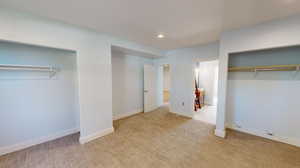 2nd basement bedroom with view of the en-suite bathroom