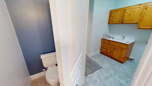 Half bath off of the laundry room