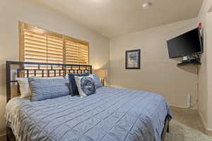 View of carpeted bedroom