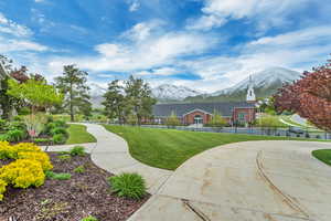 Exterior space featuring a mountain view and a yard