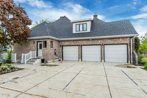 View of front of home featuring a garage