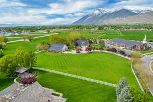 Birds eye view of property featuring a rural view and a mountain view