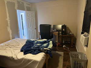 Bedroom#2 other view,  featuring dark hardwood / wood-style flooring