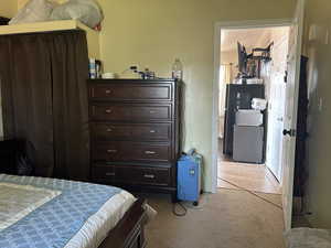 Other view of the Bedrooms #1 Carpeted bedroom featuring a black refrigerator