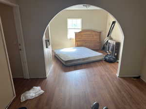 Bedroom #1 Upstairs at Building #2 featuring dark hardwood / wood-style flooring