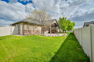 View of yard with a patio