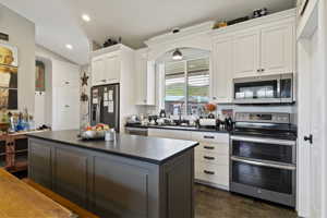 Kitchen featuring double oven & built-in microwave