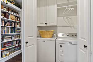 Laundry Area with hallway built-in bookshelf