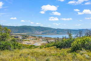 View standing on Lot 262 looking northeast with a paved Skyridge  cul-d-sac and Jordanelle in background