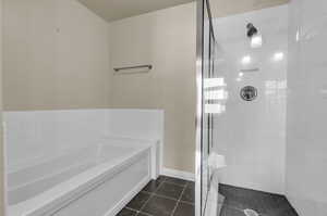 Bathroom with separate shower and tub.