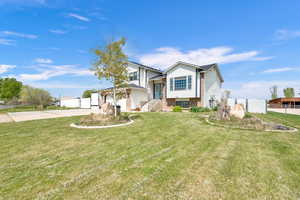 View of front of home with a front yard