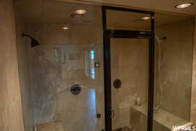 Bathroom featuring walk in shower