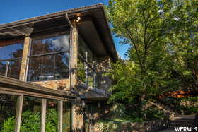 View of home's exterior featuring a sunroom