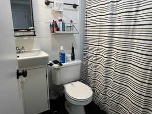 Bathroom featuring toilet and vanity