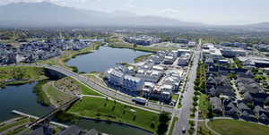 Aerial view featuring a water and mountain view