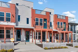 View of front of property featuring a balcony